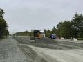 На Корсаковской трассе с 11 по 13 км приступили к устройству дорожной одежды