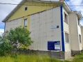В Курильске по двум адресам – в доме № 11 по улице Ленинского Комсомола и в доме № 7 по улице Строительной – начался ремонт фасадов