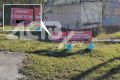 На проспекте Мира в Южно-Сахалинске рекламируют ремонт глушЕтелей