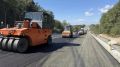 На Корсаковской трассе уложили два слоя асфальта из трех