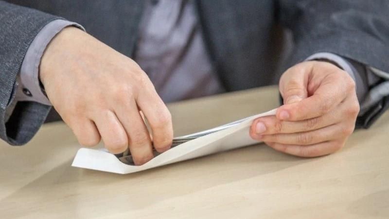 Инспектор ДПС получил взятку 30 тысяч рублей и разделил деньги с коллегами на Сахалине